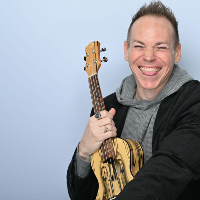 Ryan mid-performance with ukulele