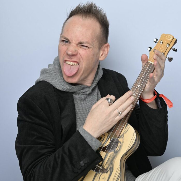 Ryan laughing with ukulele