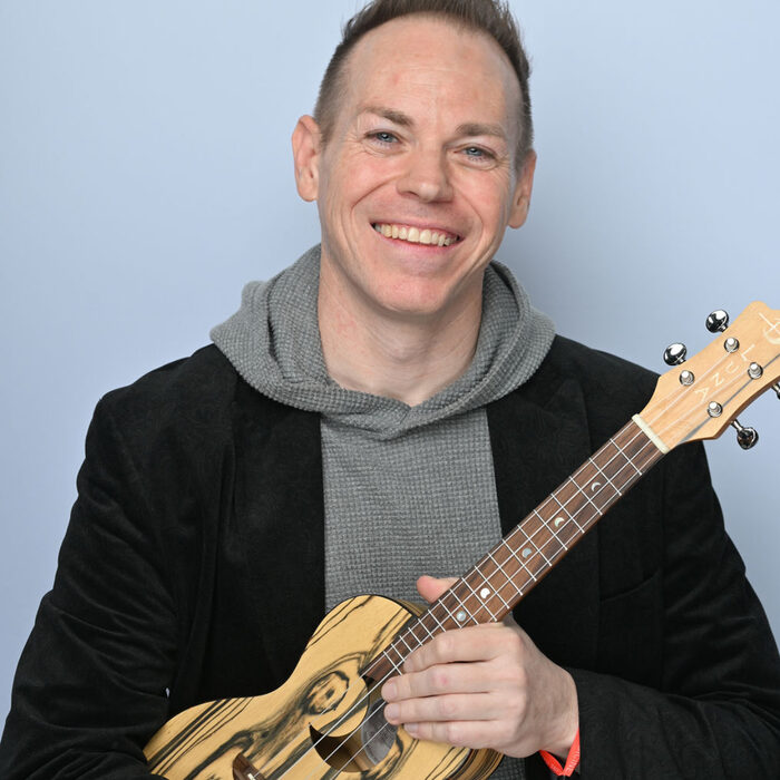 Ryan laughing with ukulele